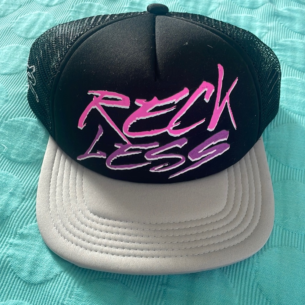 Young & Reckless snap back trucker hat.